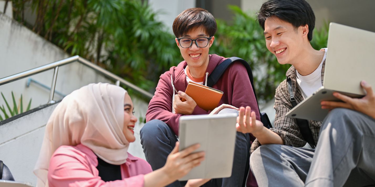 Group of diverse college students collaborating